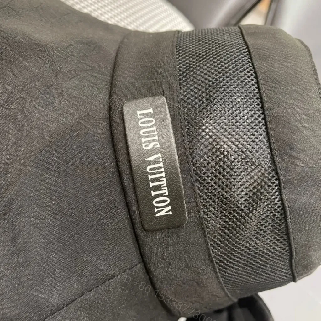 View 6 of Minimalist Black Bucket Hat with Discreet Luxe Label