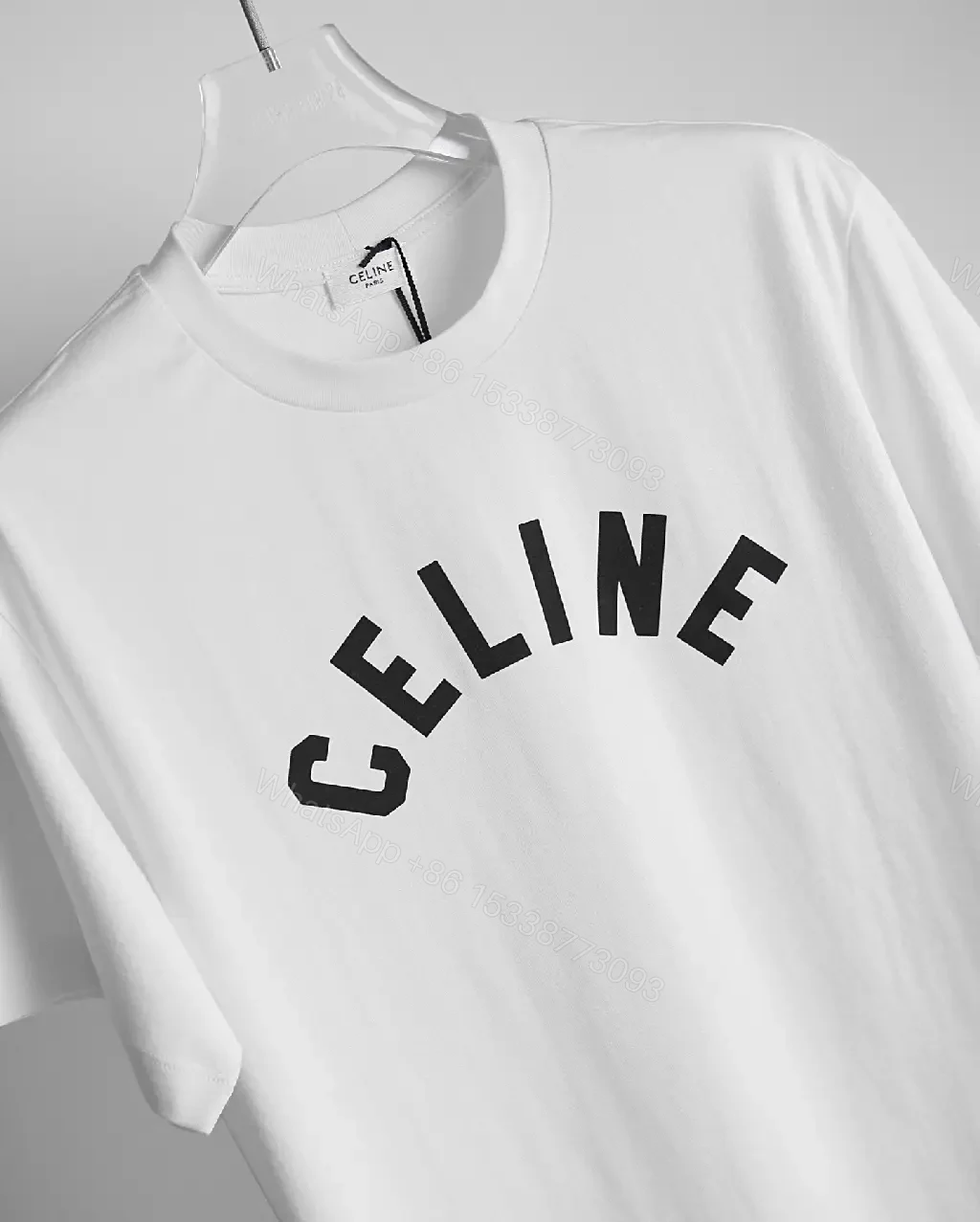 View 4 of White Cotton Graphic Tee: Bold CELINE-Inspired Minimalist Shirt