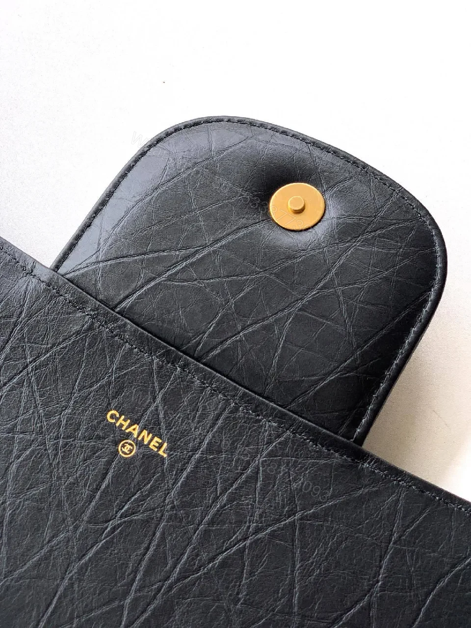 View 4 of Quilted Black Clutch with Gold-Accent Hardware Luxury Compact
