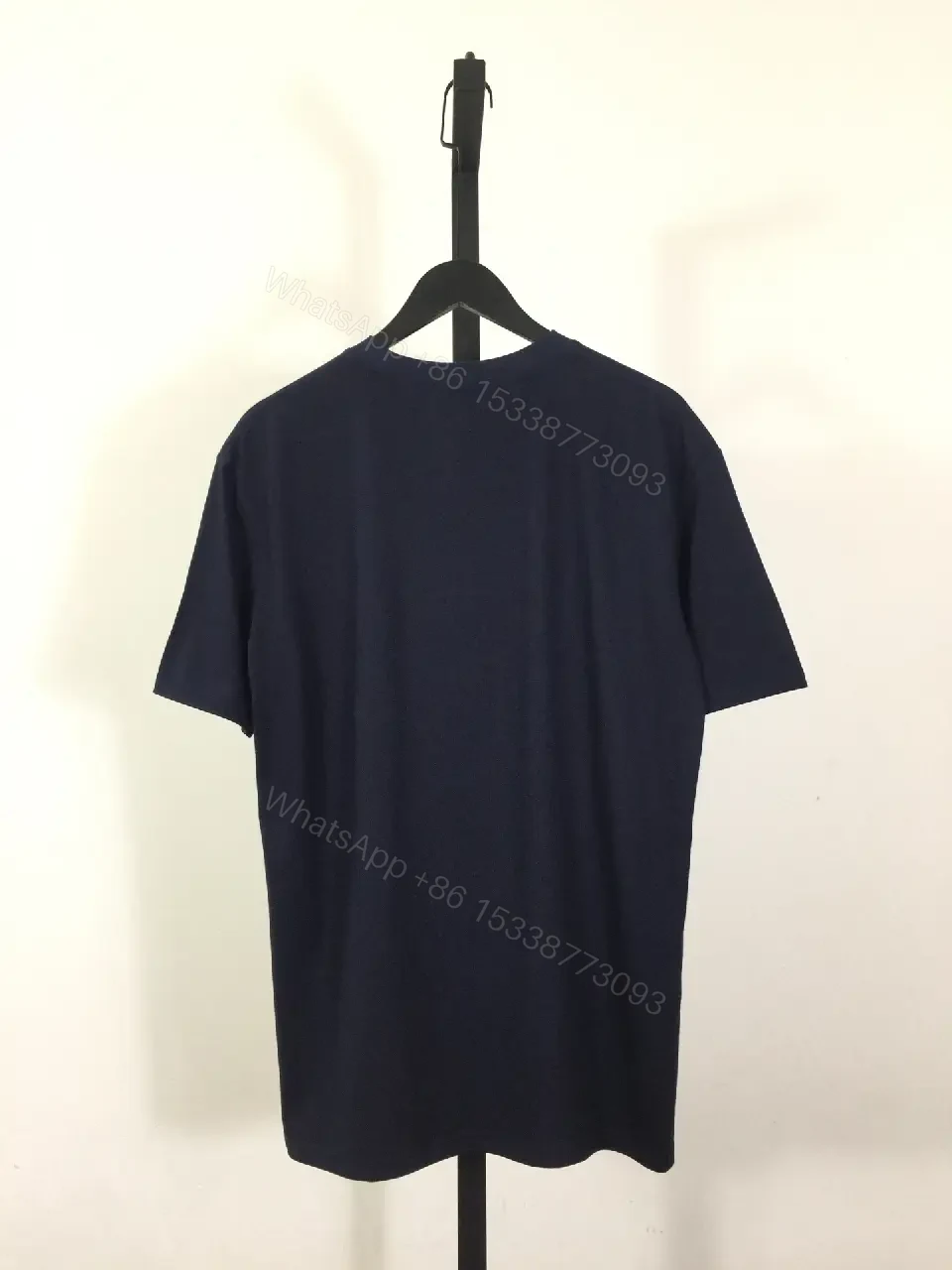 View 2 of Navy Cotton Blend Tee: Subtle Logo, Relaxed Fit, Versatile