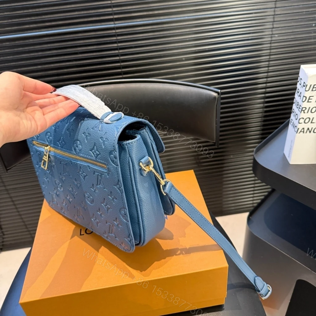 View 7 of Louis Vuitton Pochette Métis Monogram Empreinte Bleu Jean 25cm M27357