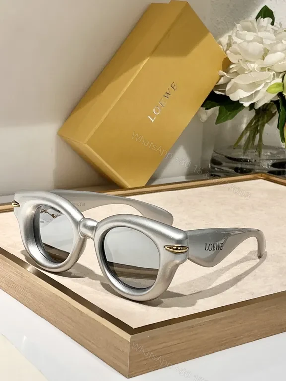 View 9 of Statement Pink Designer Sunglasses: Loewe, UV400, Stylish Comfort
