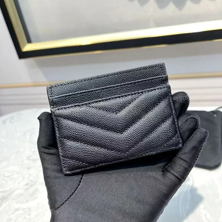 View 3 of Sleek Black Quilted Leather Cardholder with Gold YSL Logo