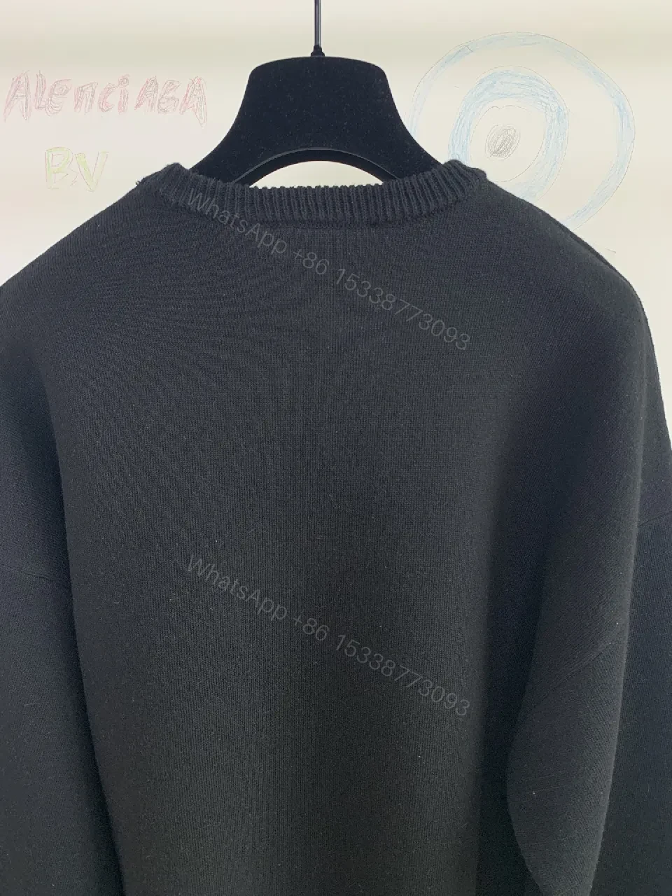 View 5 of Black Knit Luxe: Bold Texture, Subtle Branding Knitwear