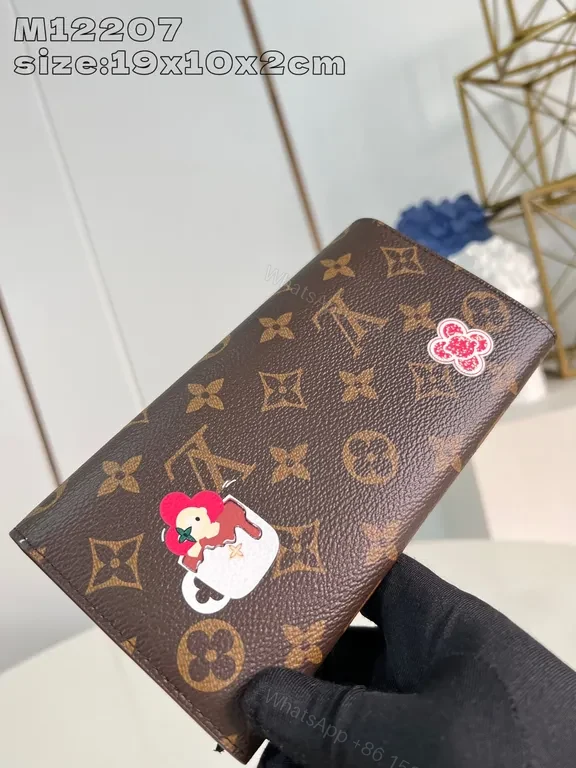 View 3 of Compact Monogram Wallet: Luxe Accent, Durable Canvas, Snap Closure