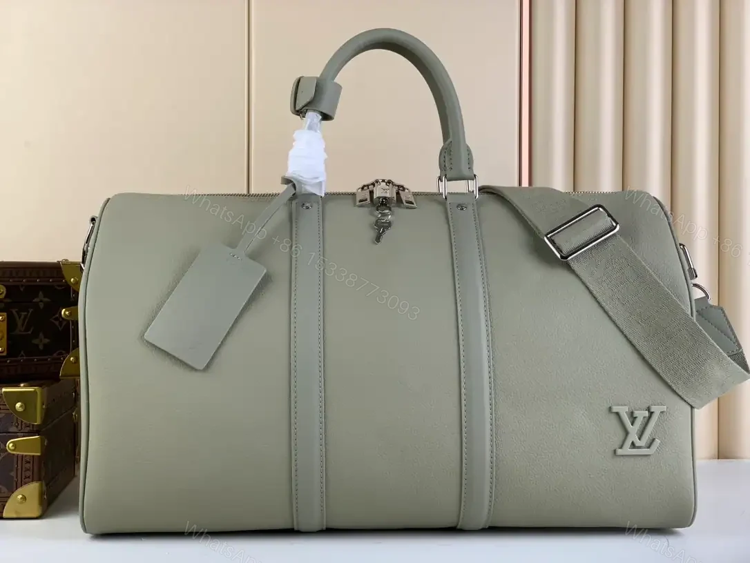 View 2 of LOUIS VUITTON KEEPALL BANDOULIÈRE 50 IN GREY – LBV424