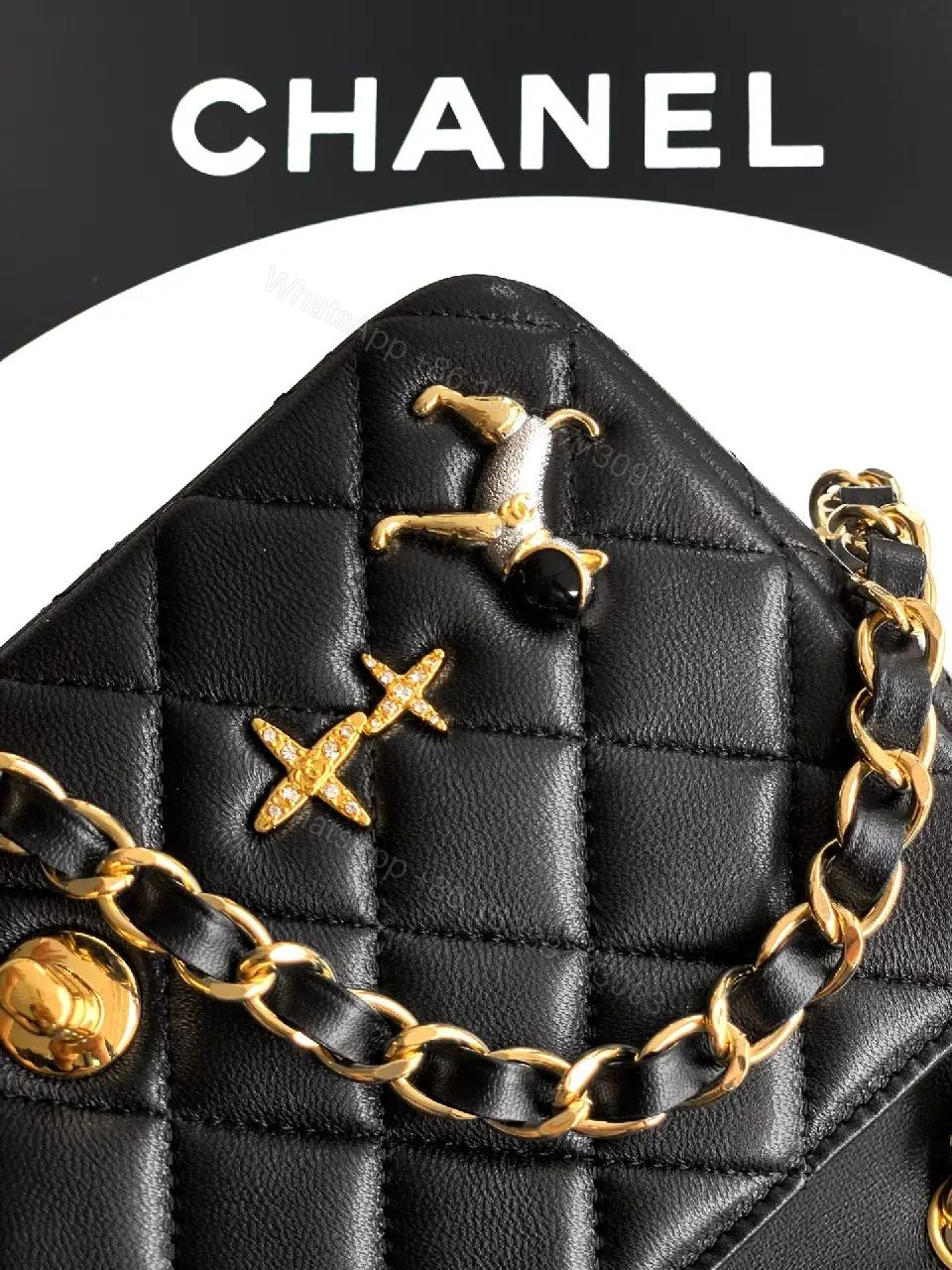 View 4 of Quilted Black Leather Crossbody: Golden Turn-Lock Charm Bag