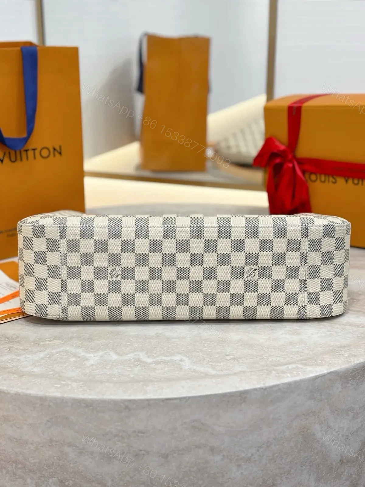 View 4 of Louis Vuitton Damier Azur Slouchy MM