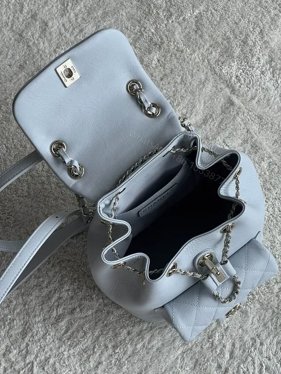 View 3 of Pastel Quilted Backpack with Chain Details â€” Modern Luxury Backpack