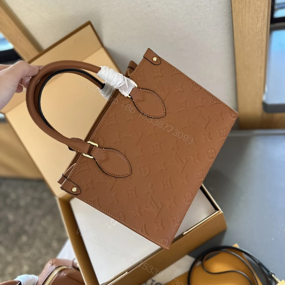 View 2 of Louis Vuitton Onthego MM Monogram Empreinte Cognac 35Cm M12775