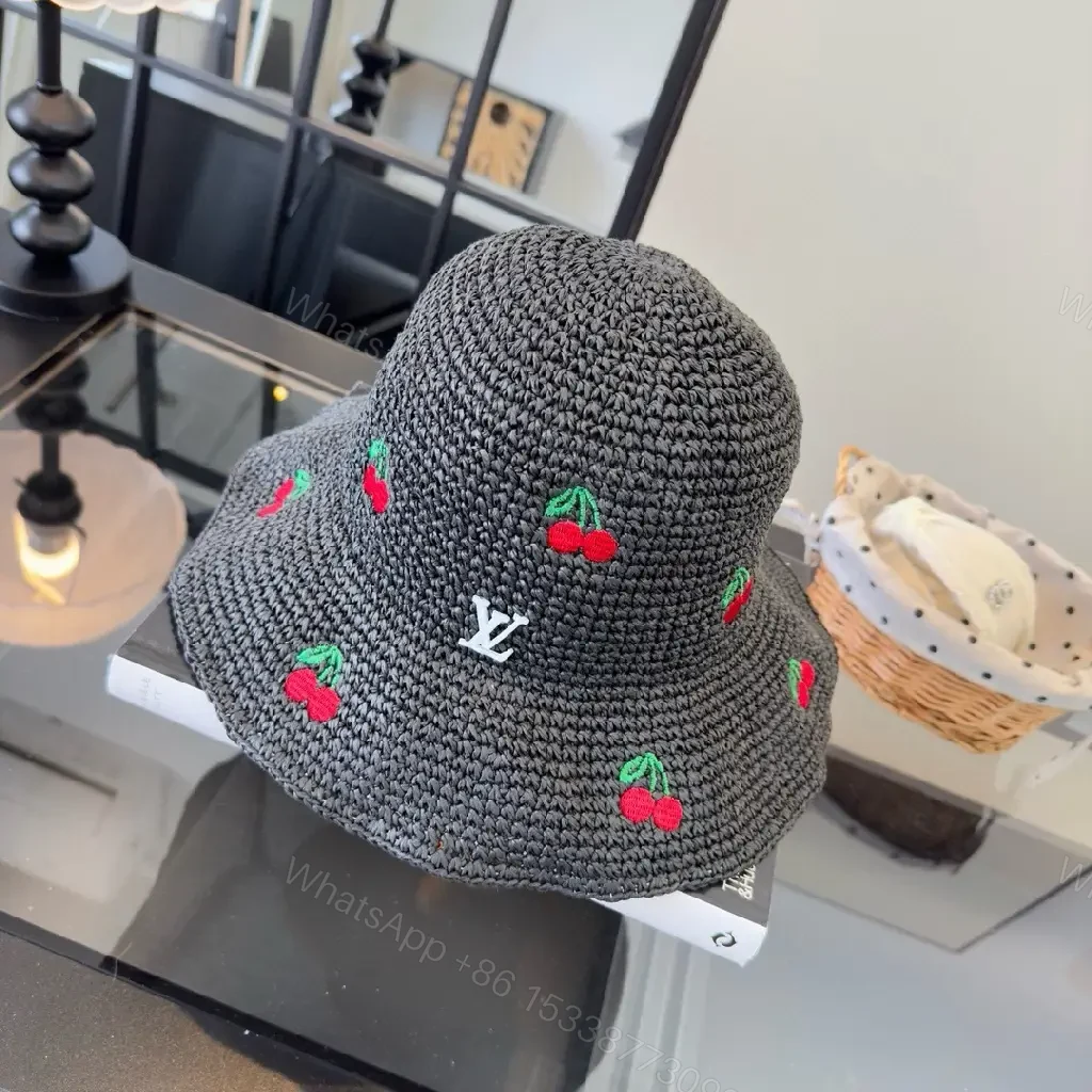 View 9 of Charcoal Crochet Bucket Hat with Cherry & LV Accent