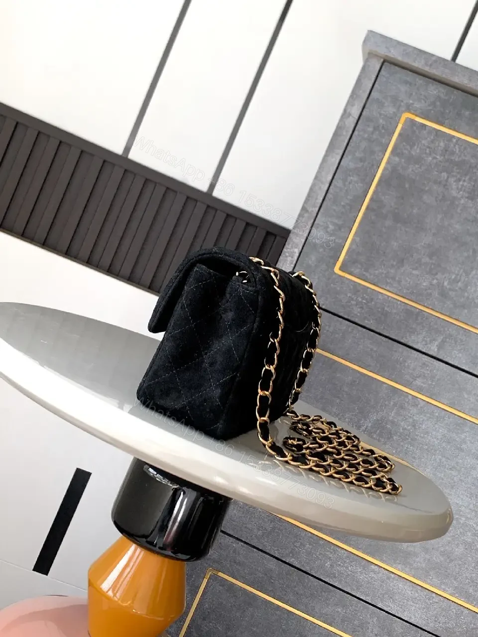 View 9 of Quilted Black Shoulder Bag with Gold Hardware - Chic Luxury Style