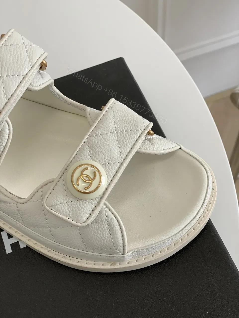 View 5 of White Quilted Sandals with Gold Emblem – Luxe Comfort Sandals