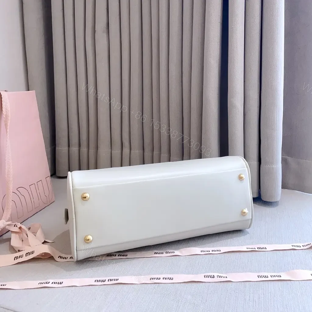 View 7 of Light Leather Dome Bag in Soft Hue, Compact Day-to-Night Carry