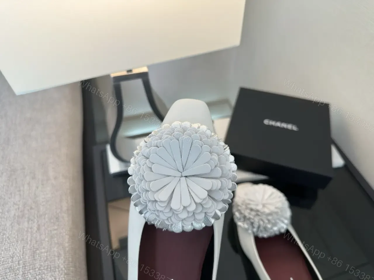 View 3 of White Leather Flats with Crochet Pom Floral—Chic Pointed-Toe Pumps