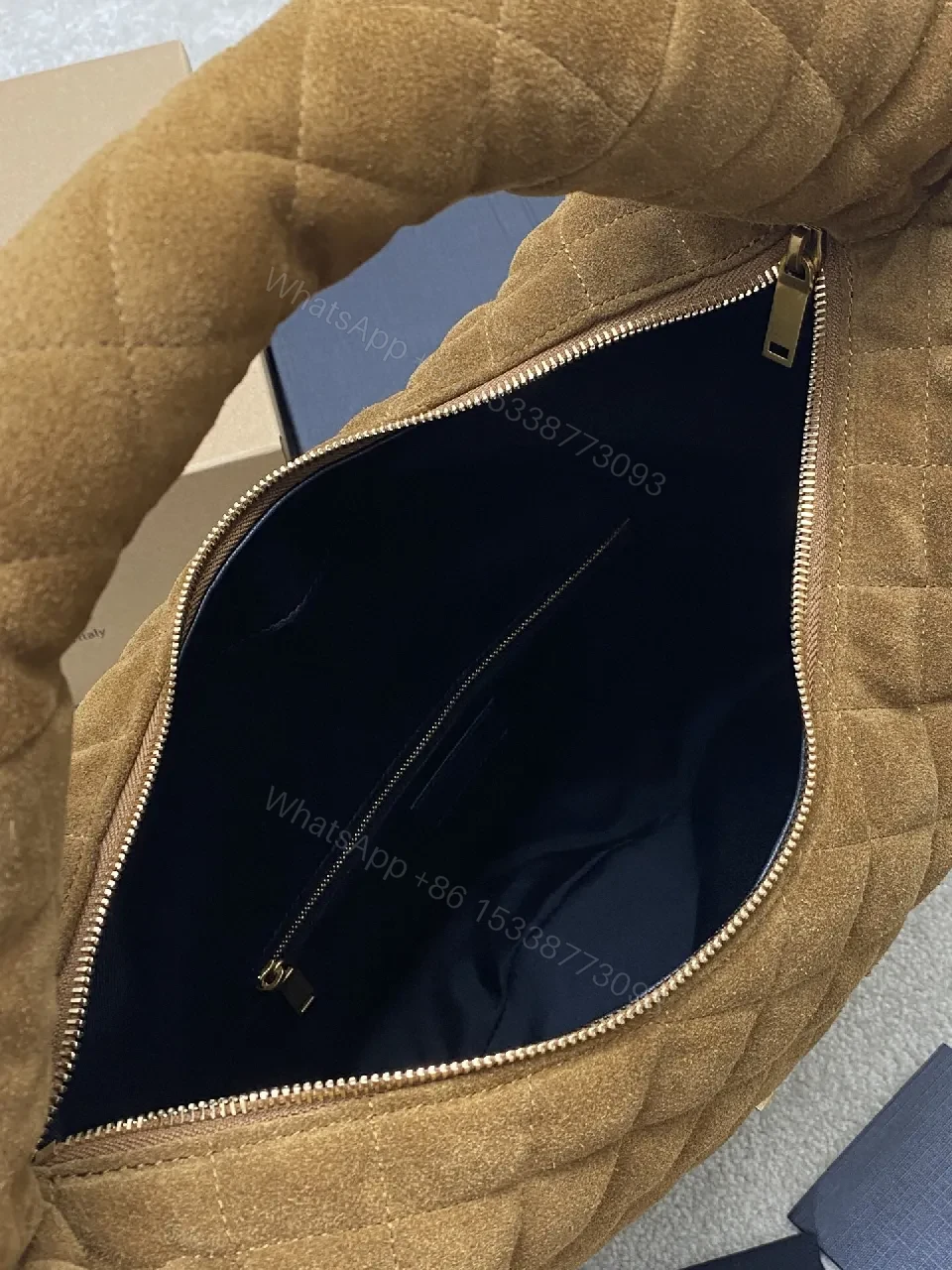 View 3 of Taupe Quilted Circle Bag - Luxury Style, Plush Top-Handle, Iconic Hardware