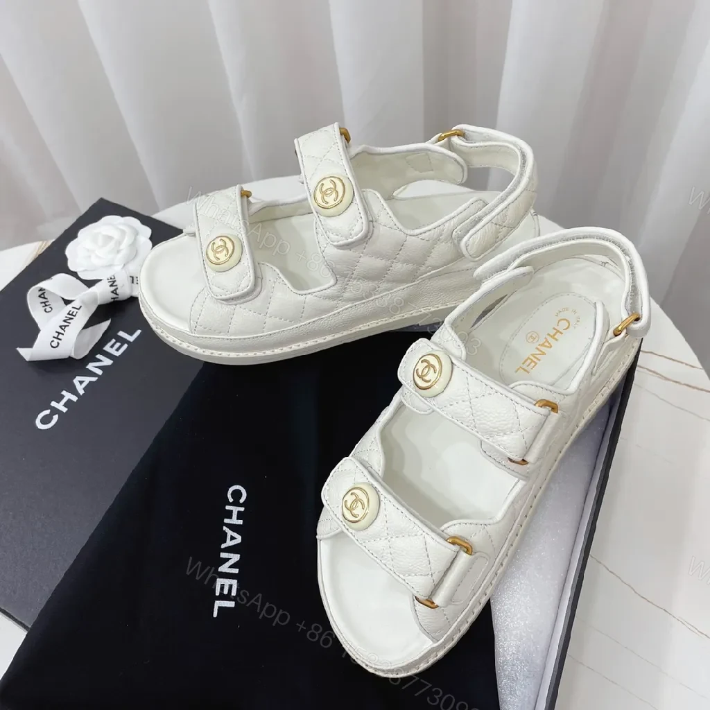White Quilted Sandals with Gold Logo – Luxe Comfort Footwear — view 1