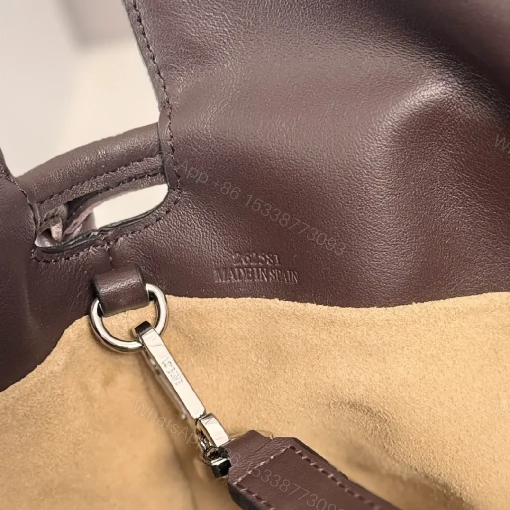 View 5 of Dark Leather Crossbody: Playful Animal Motifs, Compact Chic
