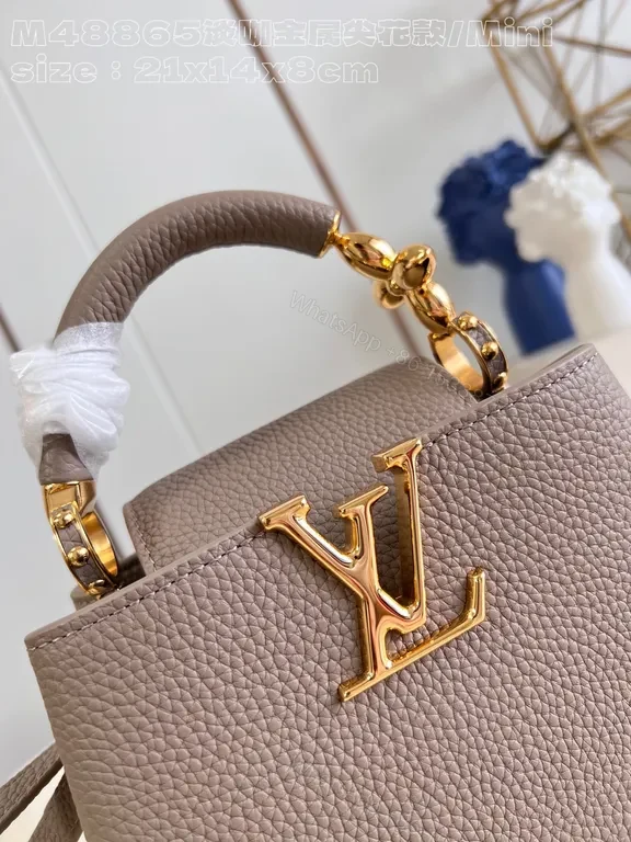 View 5 of Taupe Pebbled Leather Crossbody: Gold LV Accent, Compact Luxury Bag