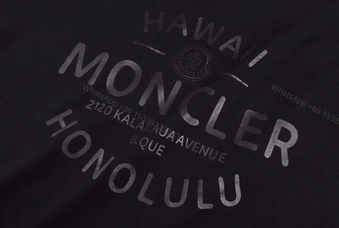 View 5 of Matte Black Cotton Tee with Subtle Embossed Logo, Modern Comfort