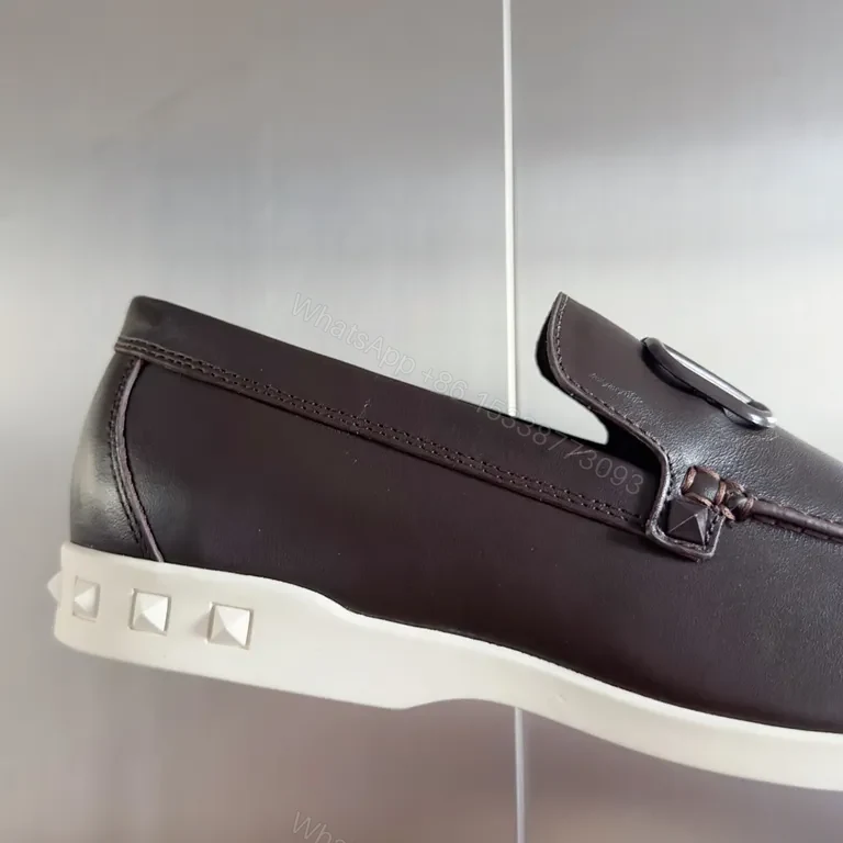 View 5 of Sleek Leather Loafers with Signature Hardware, Black, Luxury Style