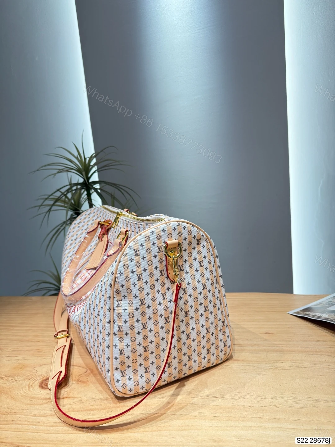 View 5 of Louis Vuitton LV Keepall Bandoulière 45 Rose