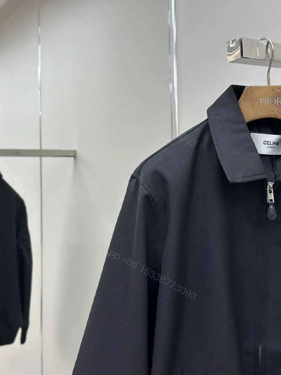View 2 of Minimalist Black Coach Jacket: Premium, Wind-Resistant Utility Jacket
