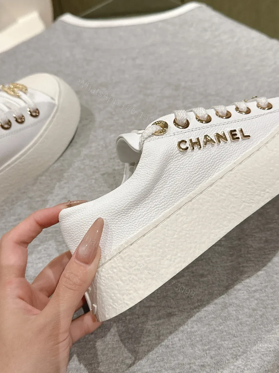 View 6 of White Leather High-Top Sneakers with Gold Accents