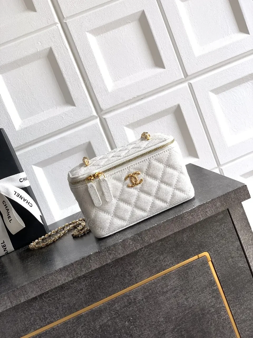 View 8 of white quilted leather bag with chain strap for everyday luxury
