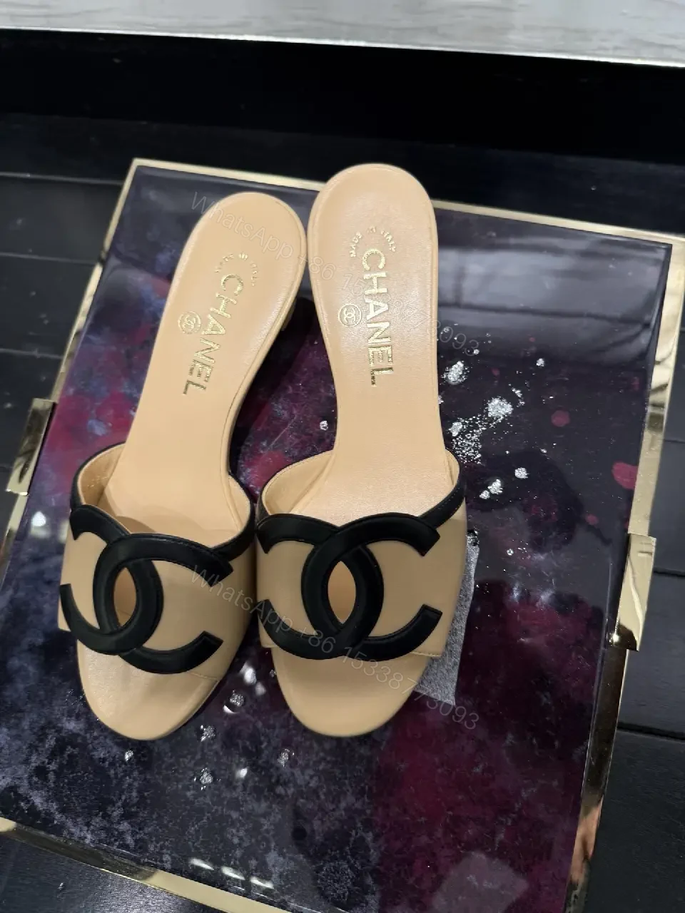 View 9 of Beige Leather Slide Signature Chanel Logo Sandals