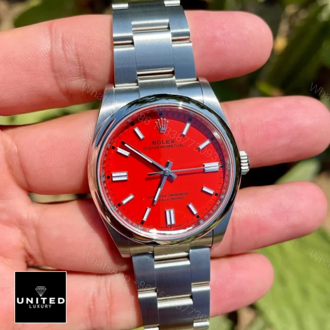 View 6 of Rolex Oyster Perpetual Red Dial 126000 Replica