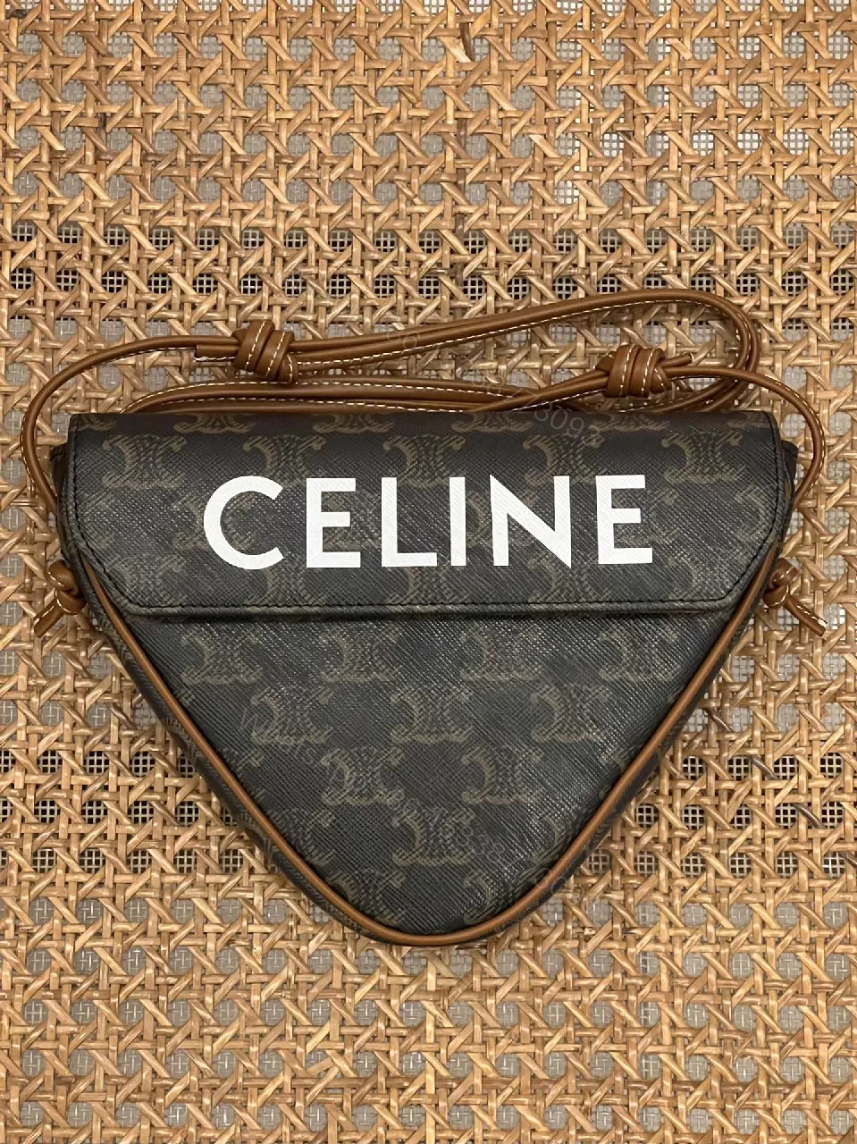 View 9 of Chic Black Monogram Cocoon Bag: Compact Luxury Crossbody