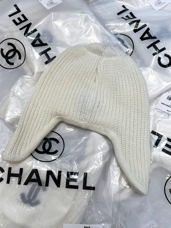View 3 of Ivory Merino Knit Ear Warmer Hat - Luxe Logo Emblem