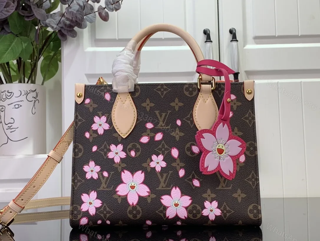 Bold Blossom Messenger: Floral Luxury Handbag, Monogrammed Canvas — view 1