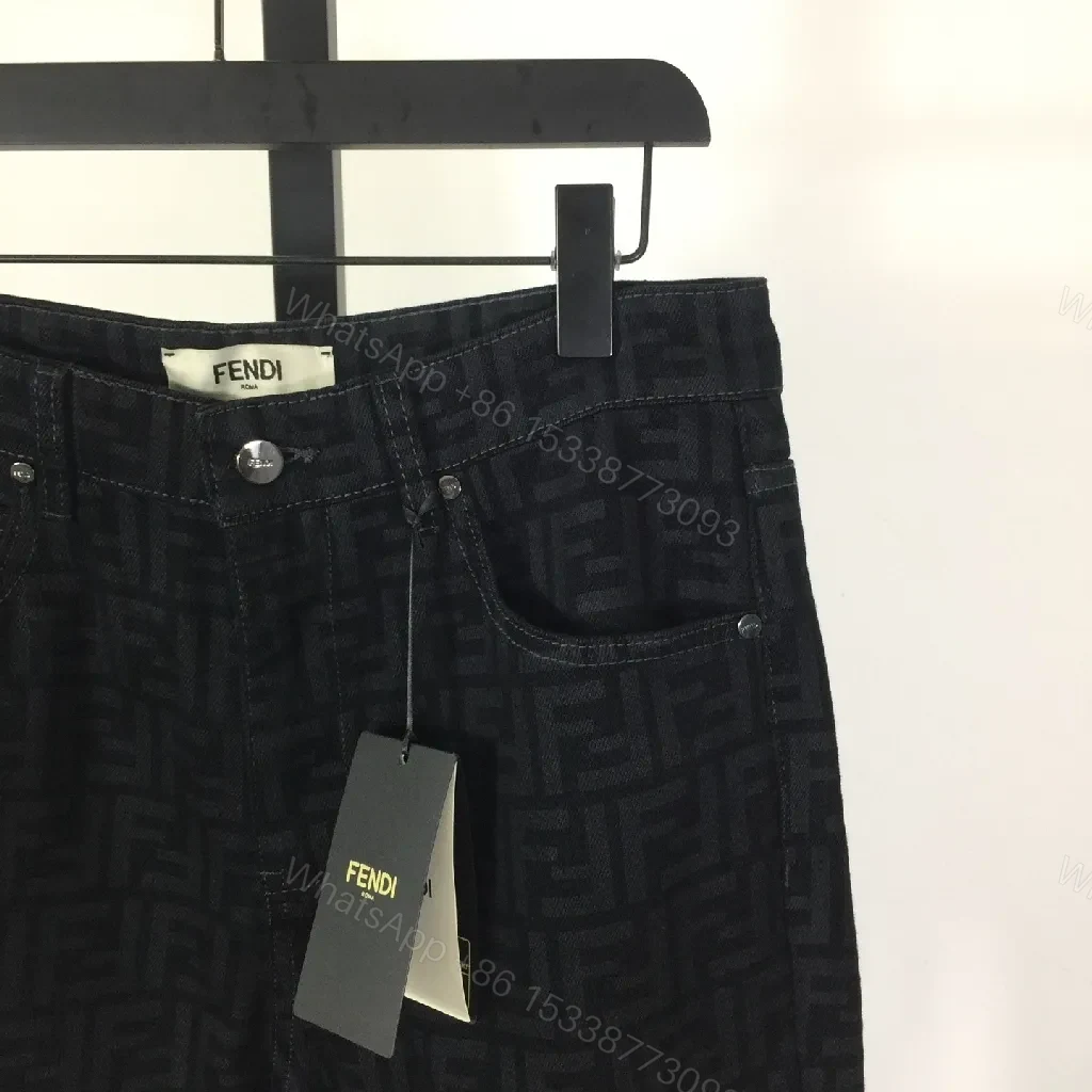 View 7 of Monogram Denim Trousers - Structured Texture, Modern Versatility