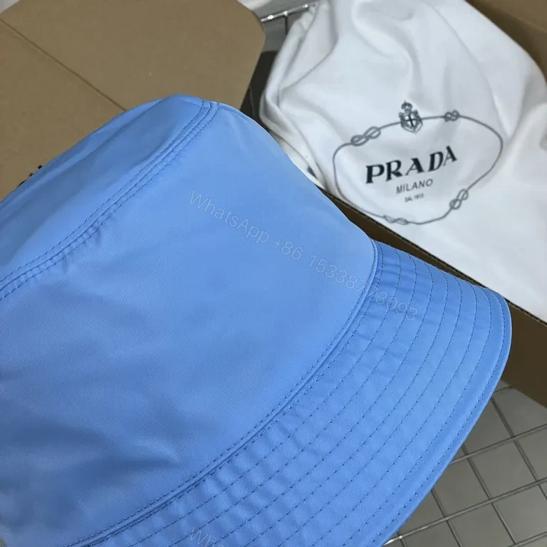 View 9 of Blue Prada Bucket Hat: Luxe Nylon, Sun-Protection, Packable