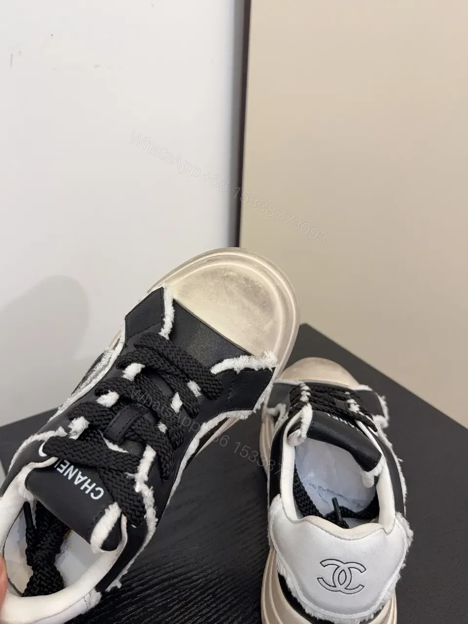 View 3 of Distressed High-Top Leather Sneaker with Bold Stitching Edge