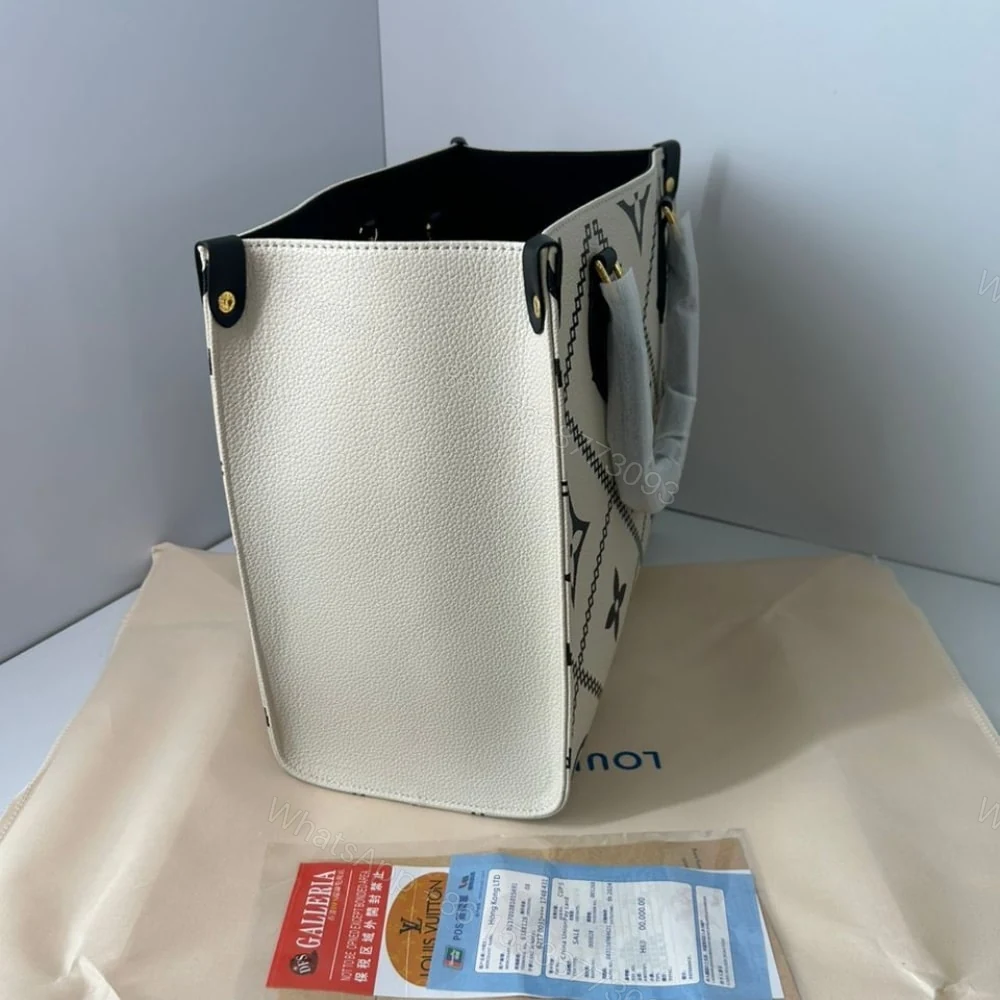 View 4 of Louis Vuitton Onthego MM White 35Cm M46016