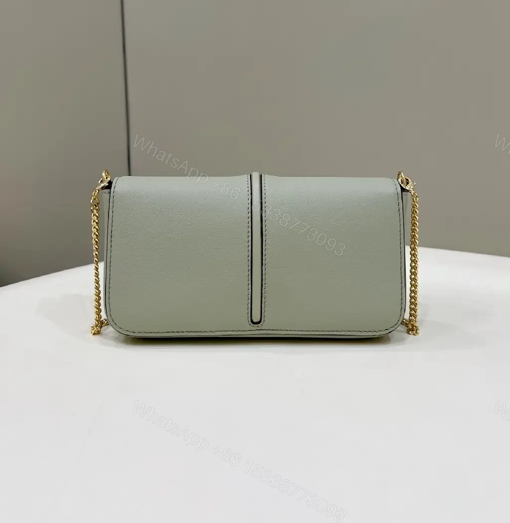 View 2 of Polished Leather Set: Gray & Gold Modern Saddle Bag & Cardholder