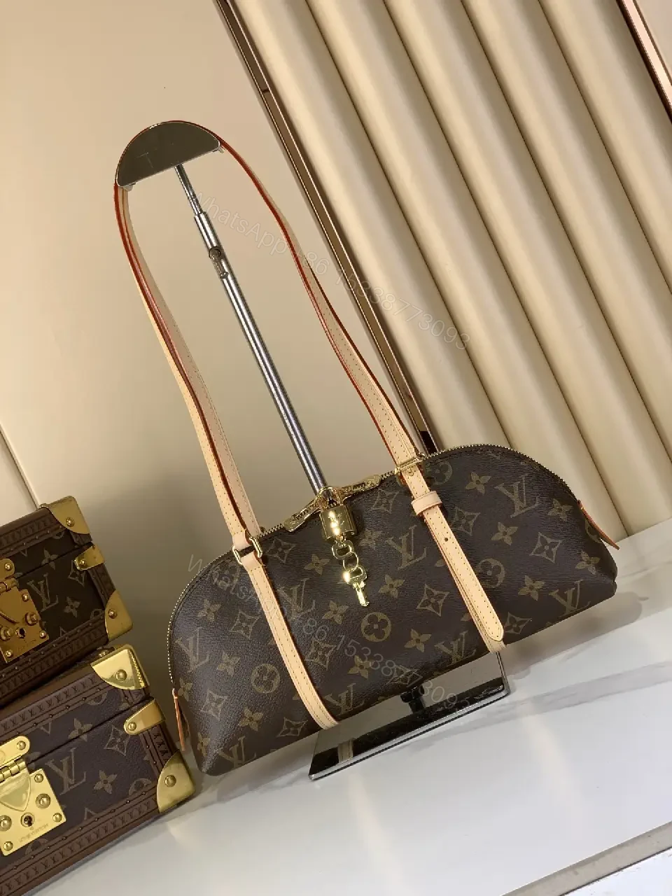 View 4 of Chic Monogram Barrel Bag: Structured, Luxurious Carryall
