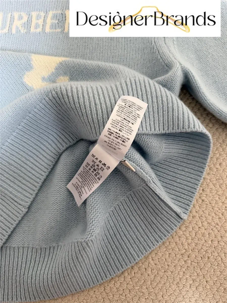 View 8 of Soft blue knit sweater, logo pony, cropped fit, premium casual style