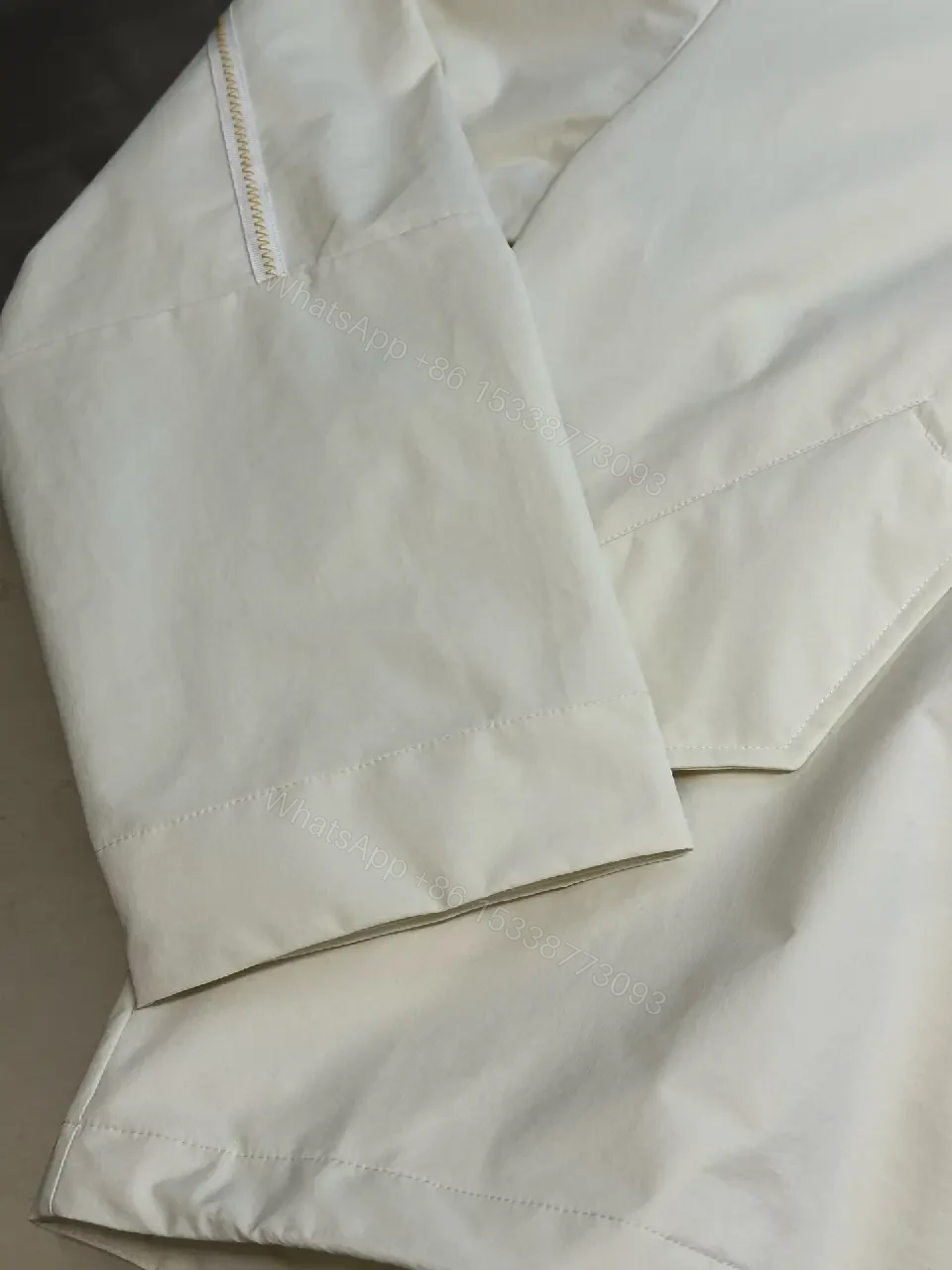 View 8 of Cream nylon lightweight hooded jacket with premium comfort for everyday luxury