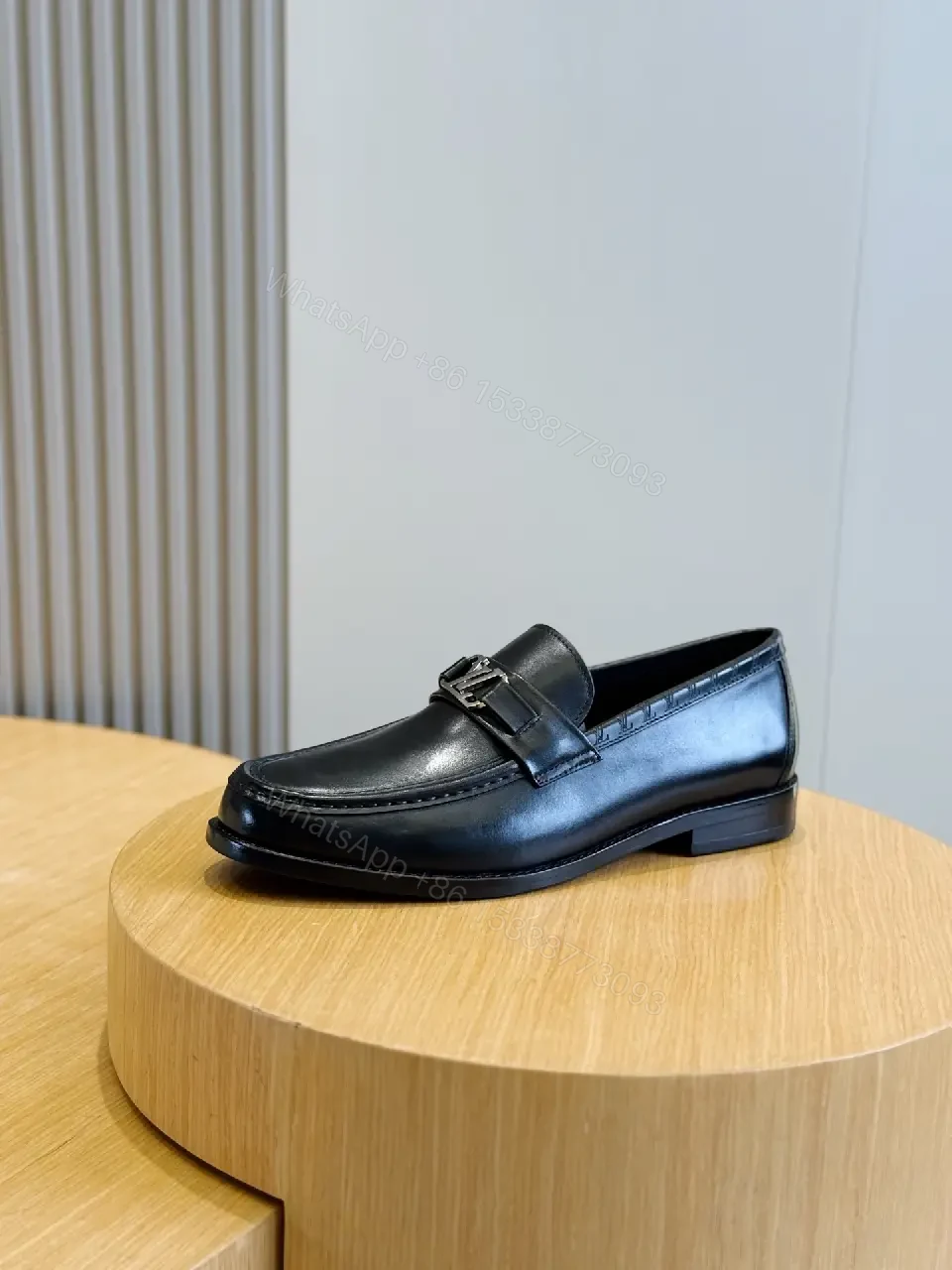 View 8 of Black Leather Loafer with LV Logo Buckle Product Type: Loafer