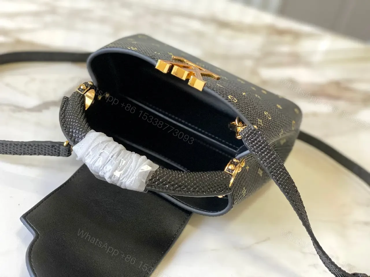 View 4 of Compact Black Pebble-Grain Top-Handle Bag with Gold Hardware