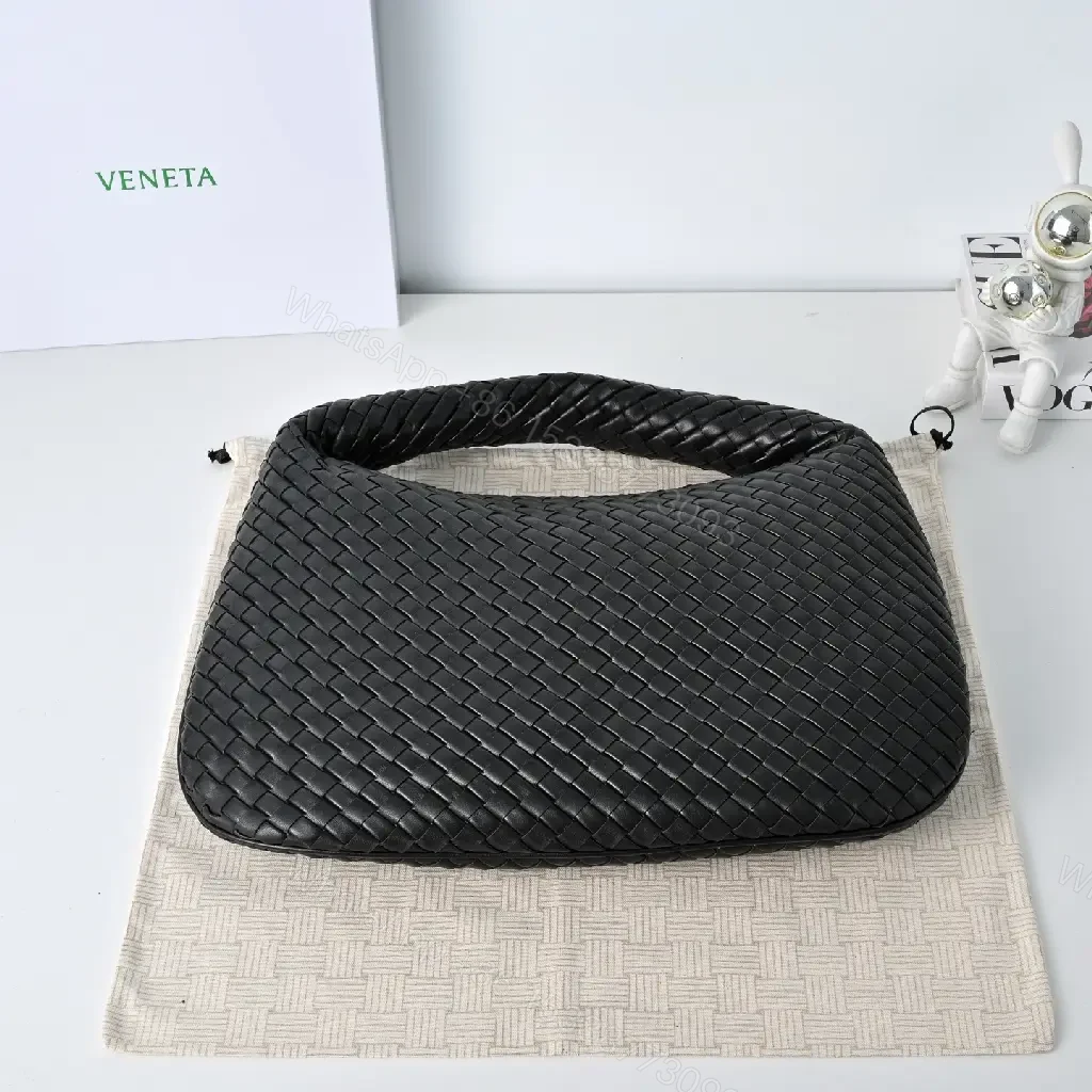View 4 of Basketweave Handbag in Black – Premium Vegan Leather, Curved Handle, Compact Luxury Bag