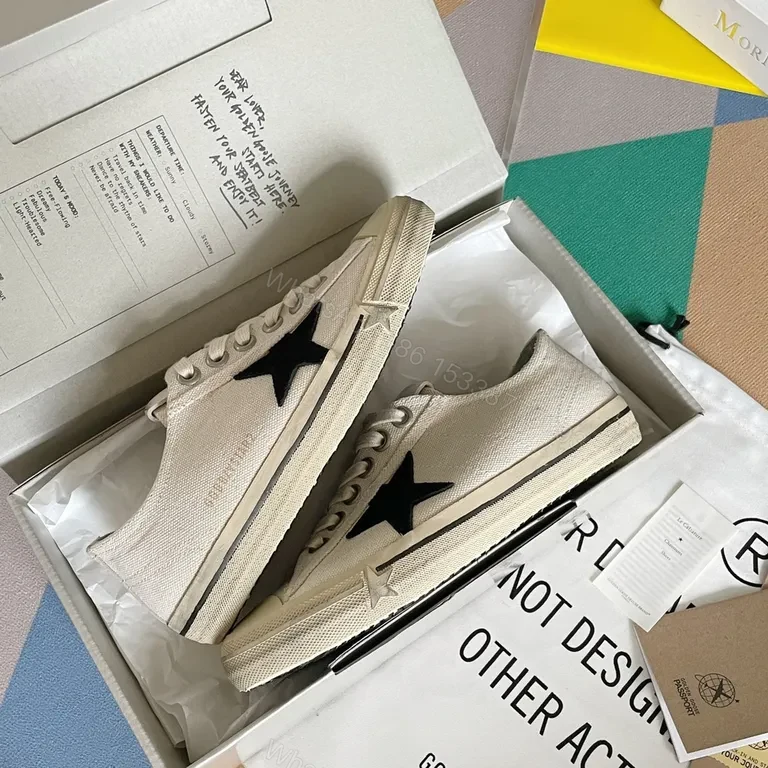 View 2 of Chic Canvas Star Sneakers - Signature Detail, Unisex