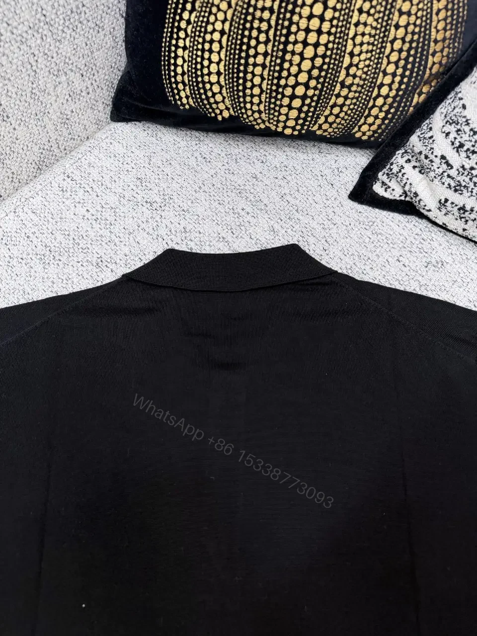 View 9 of Black Polo with Subtle Gold Logo - Refined Everyday Versatility