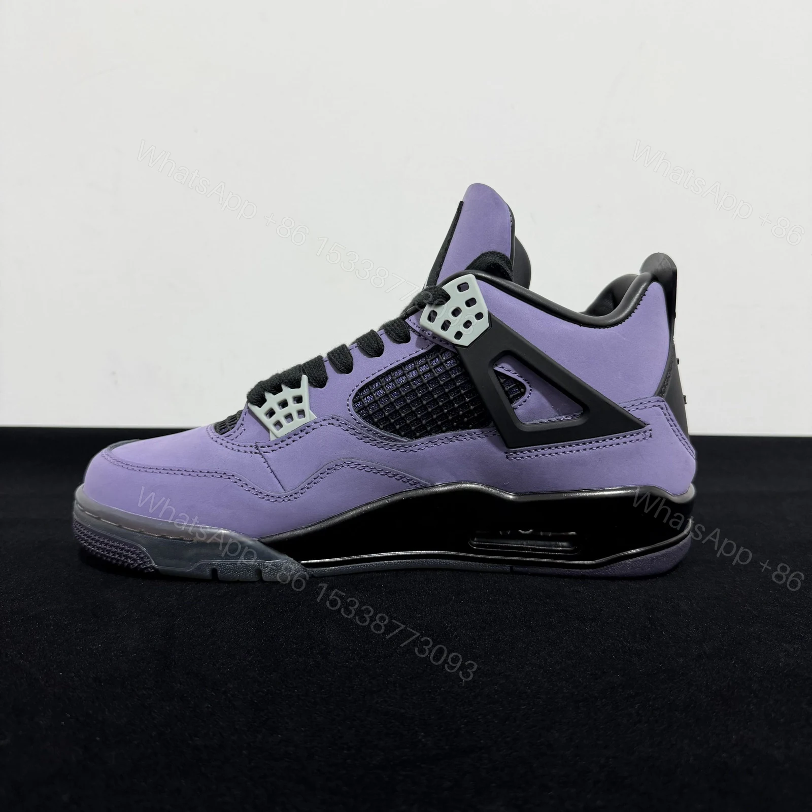 View 2 of Jordan 4 Travis Scott Purple Reps