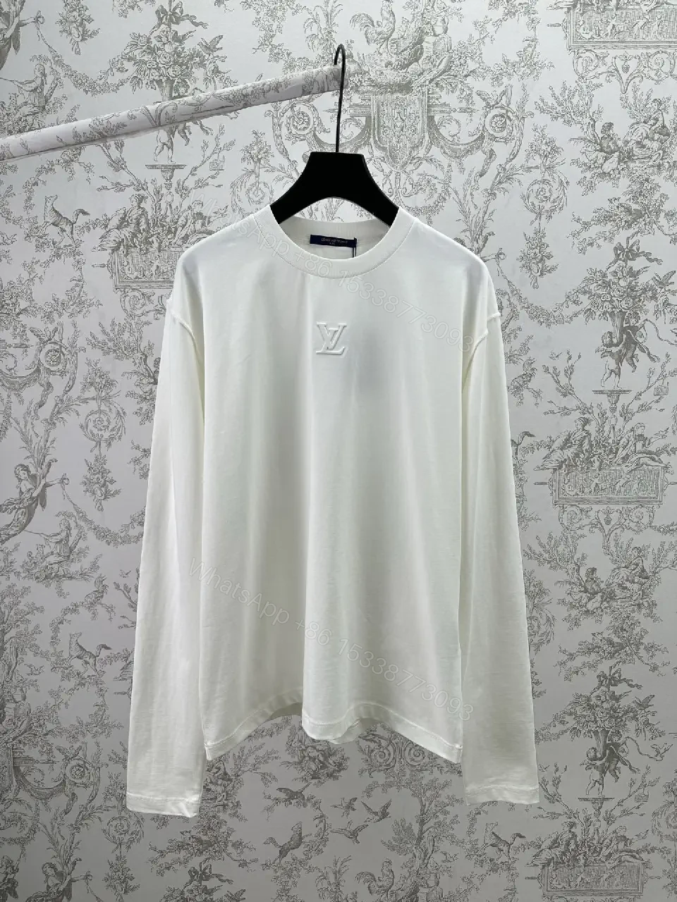 View 6 of Minimalist Luxe White Crewneck with Subtle Embossed DetailTop
