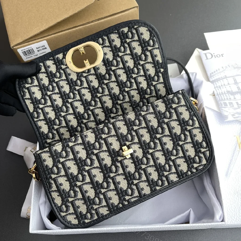 View 4 of Patterned Monogram Micro Bag with Gold Chain, Luxe Compact Accessory